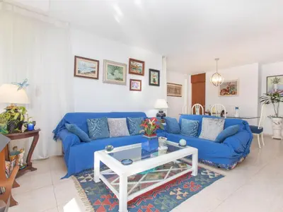 Zona de estar de Apartment Cala Bona by Interhome