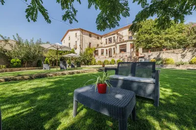 Jardín al aire libre en Masia Can Orta