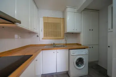 Una cocina o zona de cocina en HomeHolidaysRentals Eiffel - Costa Barcelona