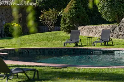 Piscina en o cerca de CASA EL MOLI DE CAN BURJATS con piscina y chimenea