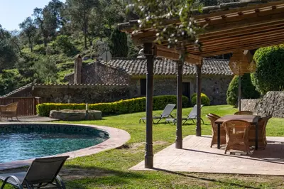 Piscina en o cerca de CASA EL MOLI DE CAN BURJATS con piscina y chimenea