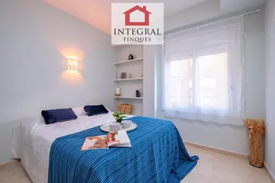 Cama o camas de una habitación en Blue Wave Apartment