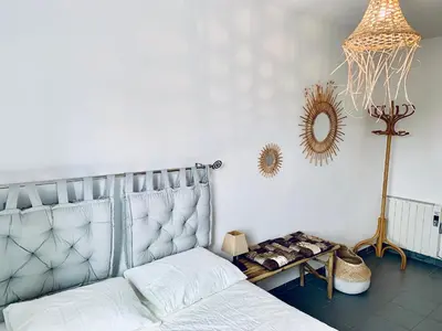 Cama o camas de una habitación en Hauzify I Apartament Fortuny