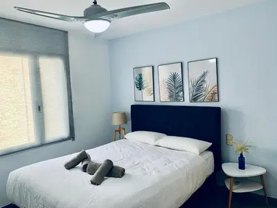 Cama o camas de una habitación en Hauzify I Apartament Fortuny