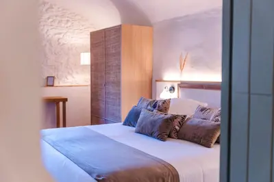 Cama o camas de una habitación en Hotel Boutique Monells Summum