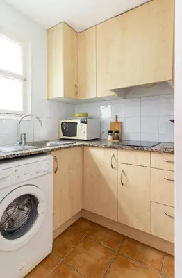 Una cocina o zona de cocina en Apartamentos CASA MAREA Calella Palafrugell con Parking