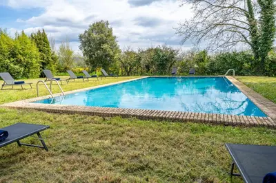 Piscina en o cerca de Masia Marco Grupos Grandes Piscina Barbacoa Aire Acondicionado