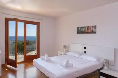 Cama o camas de una habitación en Hauzify I Casa Suredes