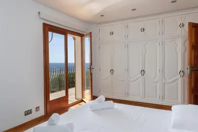Cama o camas de una habitación en Hauzify I Casa Suredes