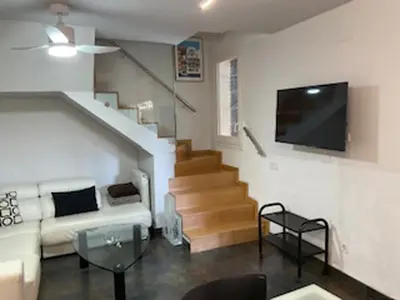 Una televisión o centro de entretenimiento en ESLORA - Playa de Aro