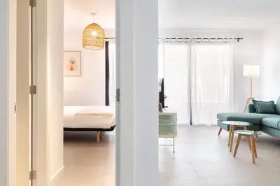 Cama o camas de una habitación en Flateli Sant Antoni 3