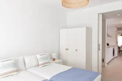 Cama o camas de una habitación en Flateli Sant Antoni 3