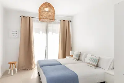 Cama o camas de una habitación en Flateli Sant Antoni 3