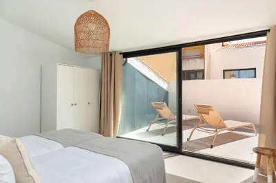 Cama o camas de una habitación en Flateli Sant Antoni 4
