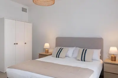 Cama o camas de una habitación en Flateli Sant Antoni 4