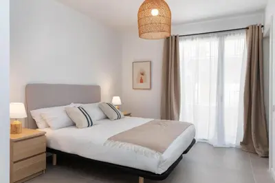 Cama o camas de una habitación en Flateli Sant Antoni 4