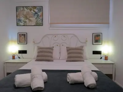 Cama o camas de una habitación en Elegante apt. p/4 pax a 1 min de la Playa con WiFI