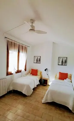 Cama o camas de una habitación en Agradable casa con terraza en S'Agaró
