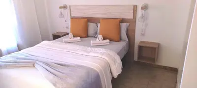 Cama o camas de una habitación en Agradable casa con terraza en S'Agaró