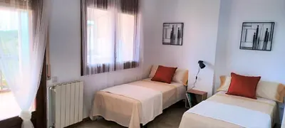 Cama o camas de una habitación en Agradable casa con terraza en S'Agaró