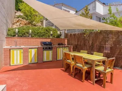 Un patio o zona al aire libre en DANLUX Rosalicia