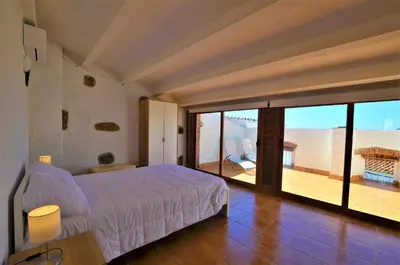 Cama o camas de una habitación en LUXURY HOUSE 8 PERSONS FRONT THE BEACH BLANES COSTA BRAVA