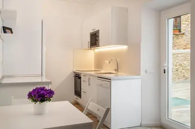 Una cocina o zona de cocina en Alta House Apartments 3 Calas