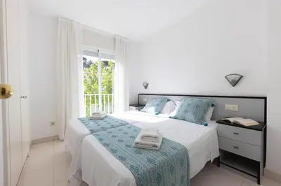 Cama o camas de una habitación en Bravissimo Estel A8 Penthouse S'Agaró