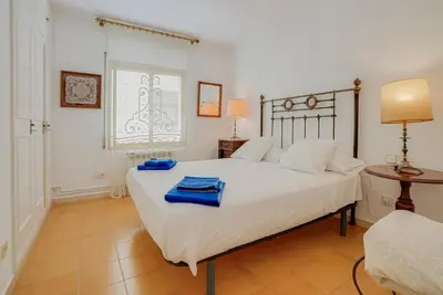 Cama o camas de una habitación en Rentalsbcn - Volantí