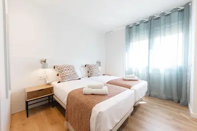 Cama o camas de una habitación en Bravissimo Falcó, 3 bedrooms and balcony