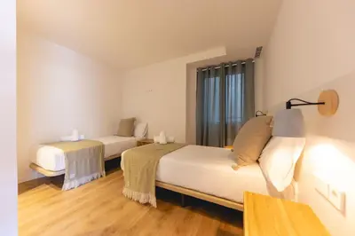 Cama o camas de una habitación en Bravissimo Domènica, 2 bedrooms and balcony