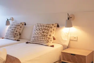 Cama o camas de una habitación en Bravissimo Afra, 2-bedroom apartment