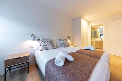 Cama o camas de una habitación en Bravissimo Afra, 2-bedroom apartment