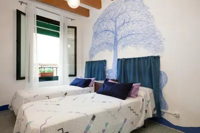 Cama o camas de una habitación en Let's Holidays HOUSE IN THE HEART OF TOSSA