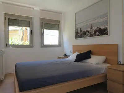 Cama o camas de una habitación en Precioso apartamento familiar con aparcamiento