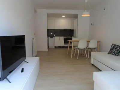 Una cocina o zona de cocina en Precioso apartamento familiar con aparcamiento