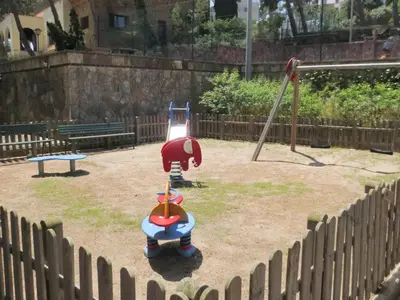 Zona de juegos infantil en Apartamento Eden Mar Torre Valentina, Sant Antonio de Calonge
