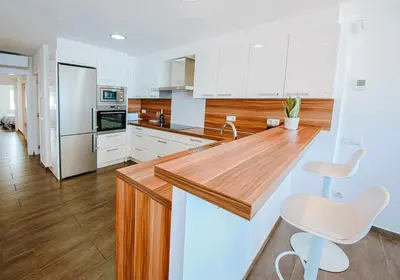 Una cocina o zona de cocina en Apartamento exclusivo en primera línea de mar