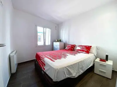 Cama o camas de una habitación en Apartamento exclusivo en primera línea de mar