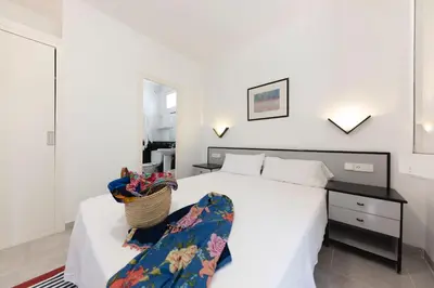 Cama o camas de una habitación en Bravissimo Vil·les Brusi A S'Agaró