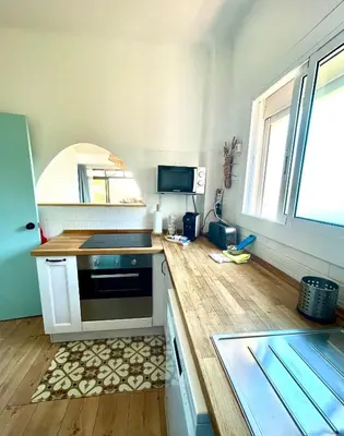 Una cocina o zona de cocina en Finestra del Mar
