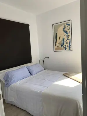 Cama o camas de una habitación en Àtic de Palamós