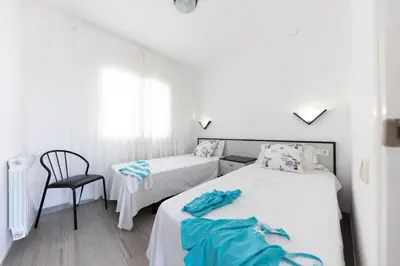 Cama o camas de una habitación en Bravissimo Vil·les Brusi C S'Agaró