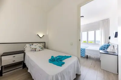 Cama o camas de una habitación en Bravissimo Vil·les Brusi D S'Agaró