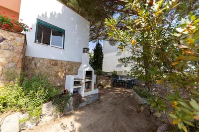 Jardín al aire libre en Bravissimo Vil·les Brusi D S'Agaró