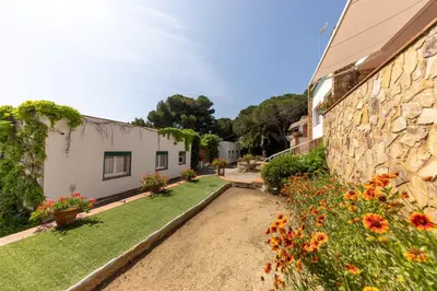 Jardín al aire libre en Bravissimo Vil·les Brusi D S'Agaró