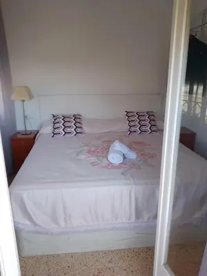 Cama o camas de una habitación en Rooms Pineda
