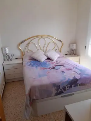 Cama o camas de una habitación en Rooms Pineda