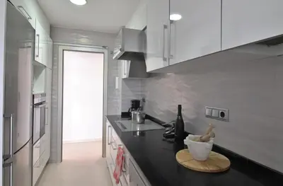 Una cocina o zona de cocina en Apartamento esquinero en Palamós
