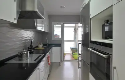 Una cocina o zona de cocina en Apartamento esquinero en Palamós